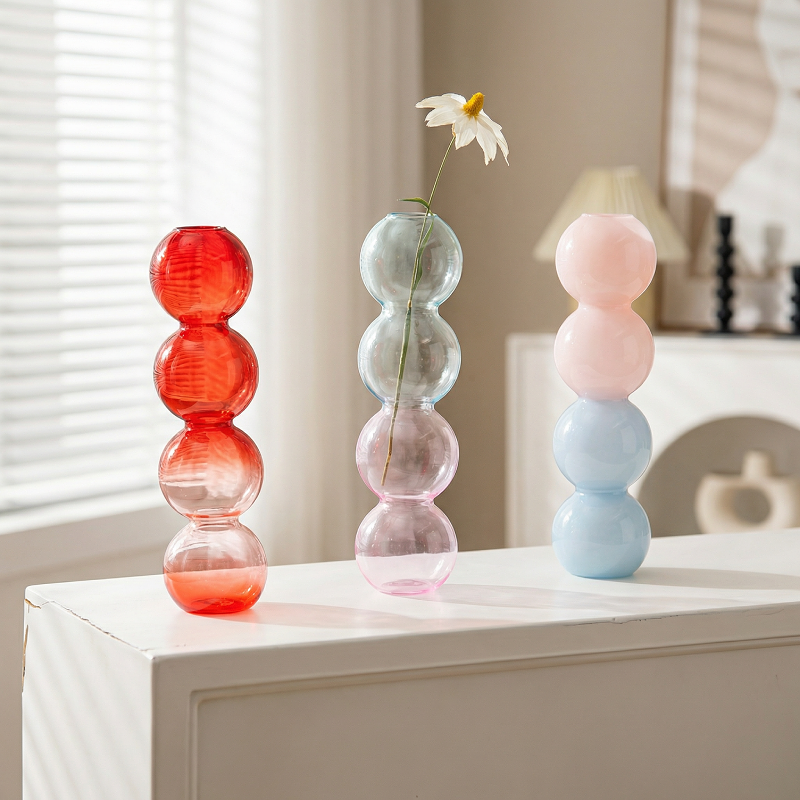 Collection trio vases verre formes sphériques quatre boules lifestyle