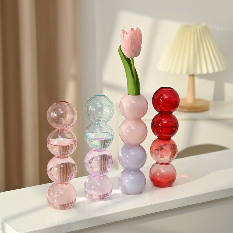 Collection vases verre formes sphériques quatre boules