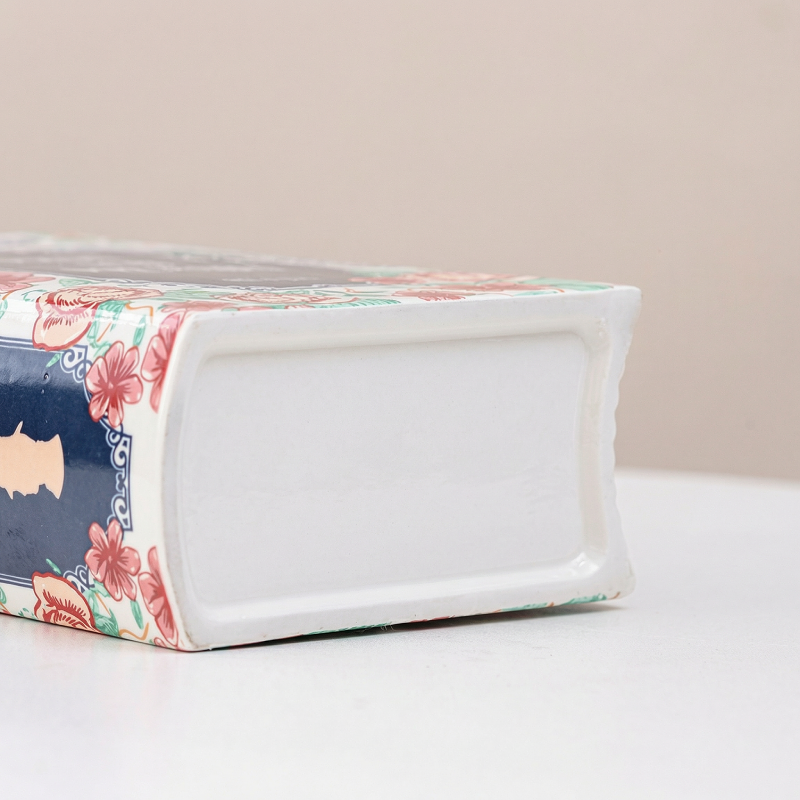Vase céramique forme livre détail bas