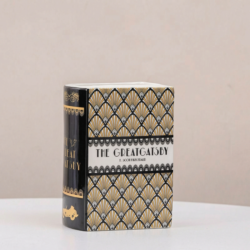 Vase céramique forme livre noir et doré