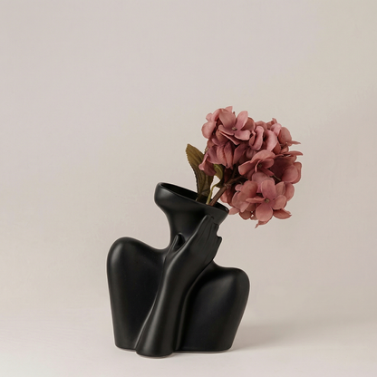 Vase céramique noir buste femme avec hortensia