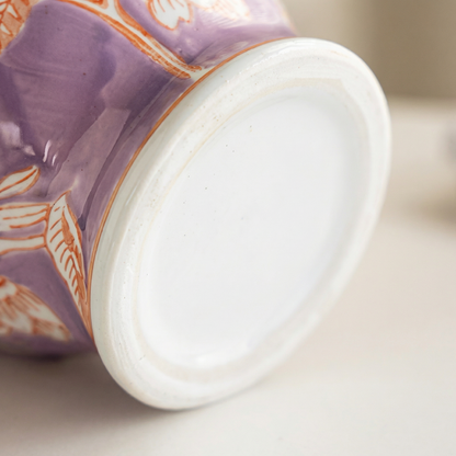 Vase céramique violet motif floral détail bas