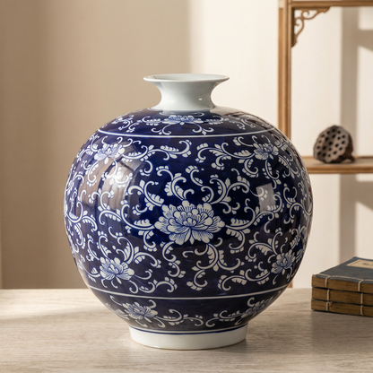 Vase porcelaine bleu motifs floraux arabesques